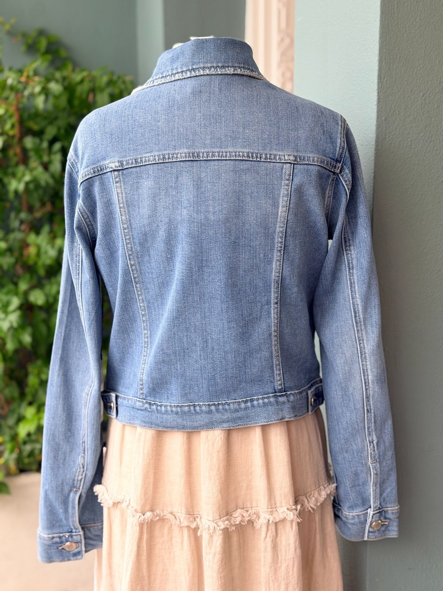 Maddy Medium Wash Denim Jacket back view on mannequin