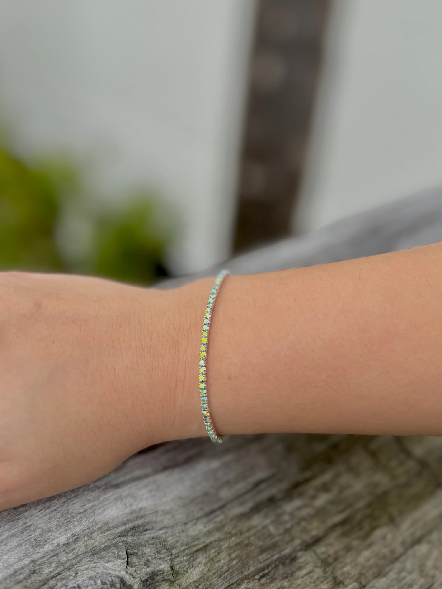 Marie Sparkly AB Green Bracelet on model's wrist