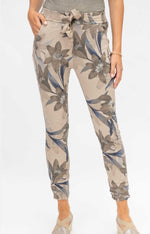 Front view of Megan Floral Pants in Brown with Italian crinkle fabric and floral print at Ardor Boutique