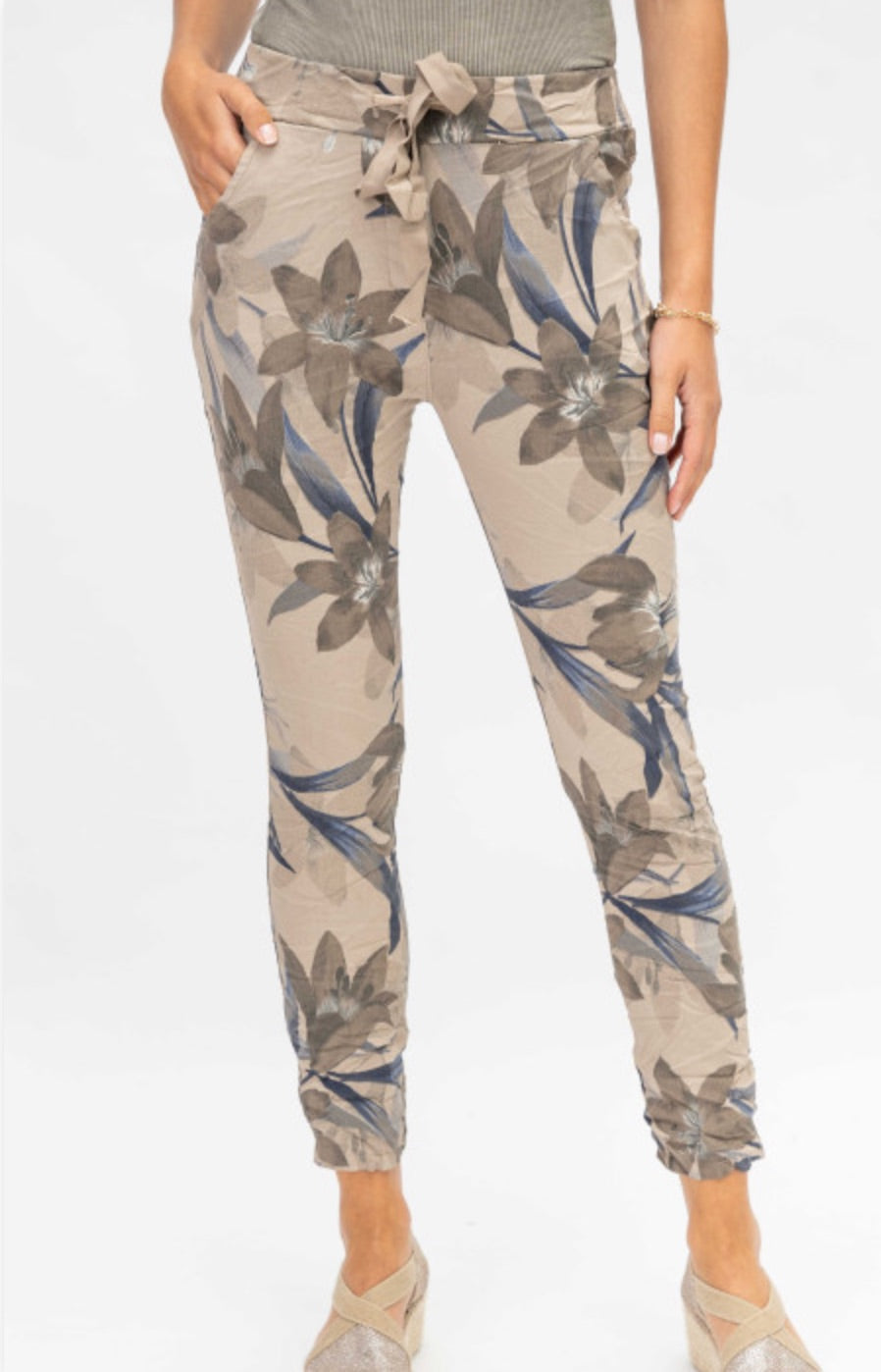 Front view of Megan Floral Pants in Brown with Italian crinkle fabric and floral print at Ardor Boutique