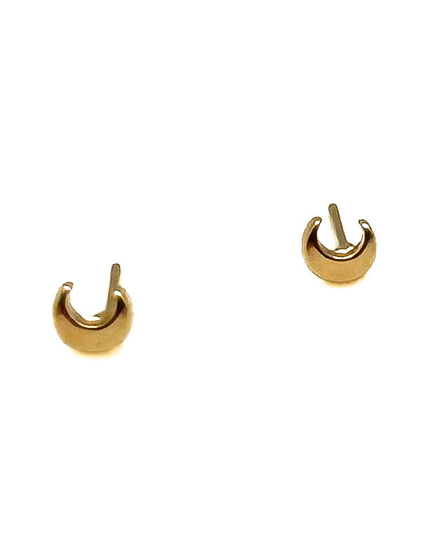 A pair of small gold crescent moon stud earrings on a plain white background.