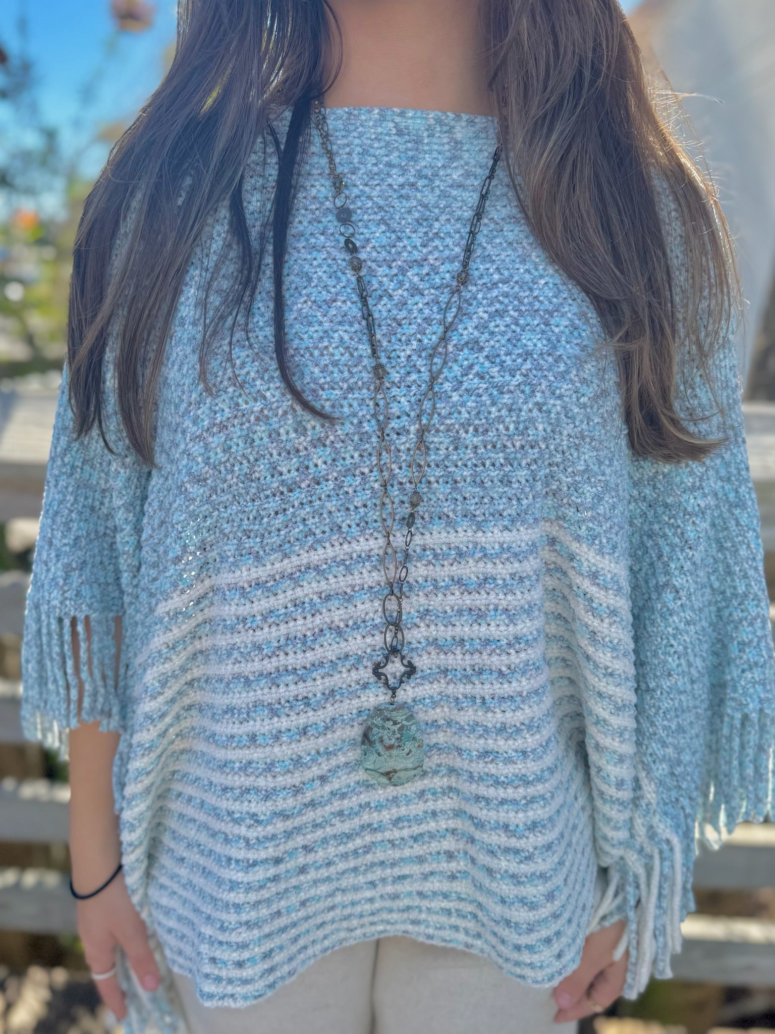 Model wearing long natural brass Jasper necklace by Nina Halls