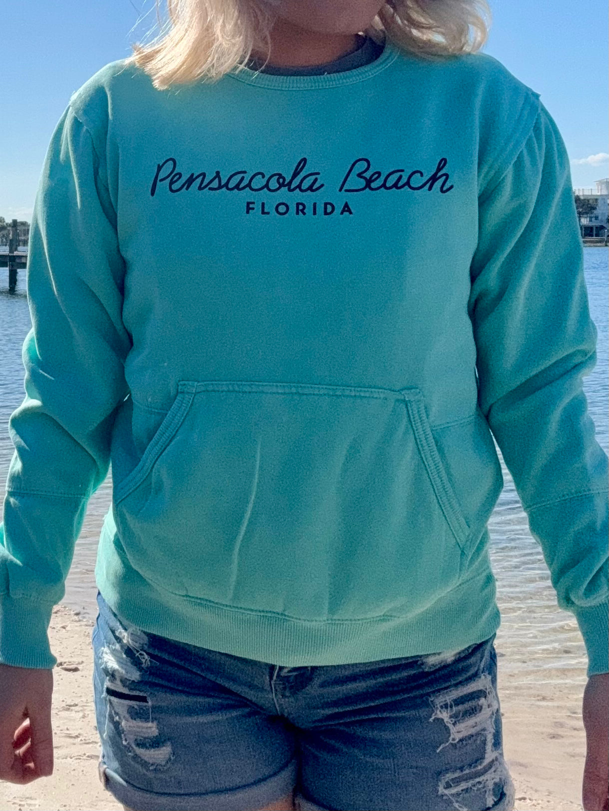 Pensacola Beach Florida Sweatshirt in aqua shown on a model