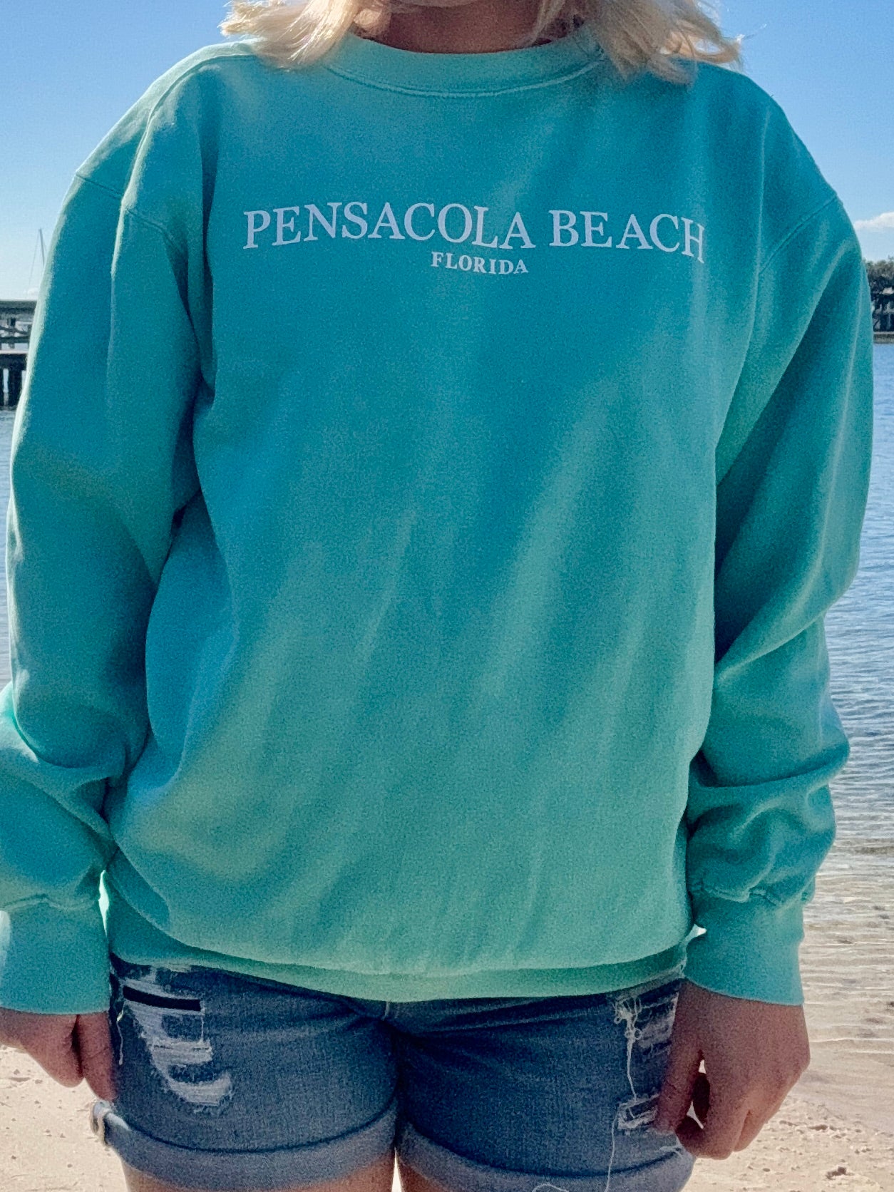 Pensacola Beach Icon sweatshirt front view shown on a model in size small