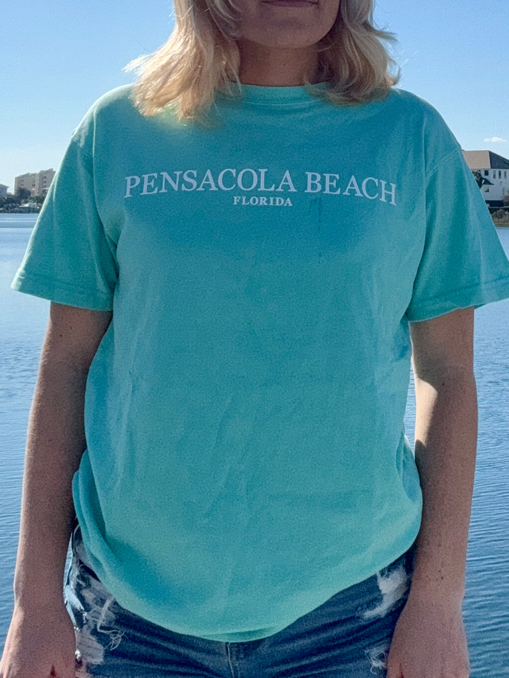 Pensacola Beach Icon T shirt in aqua front view shown on model size small