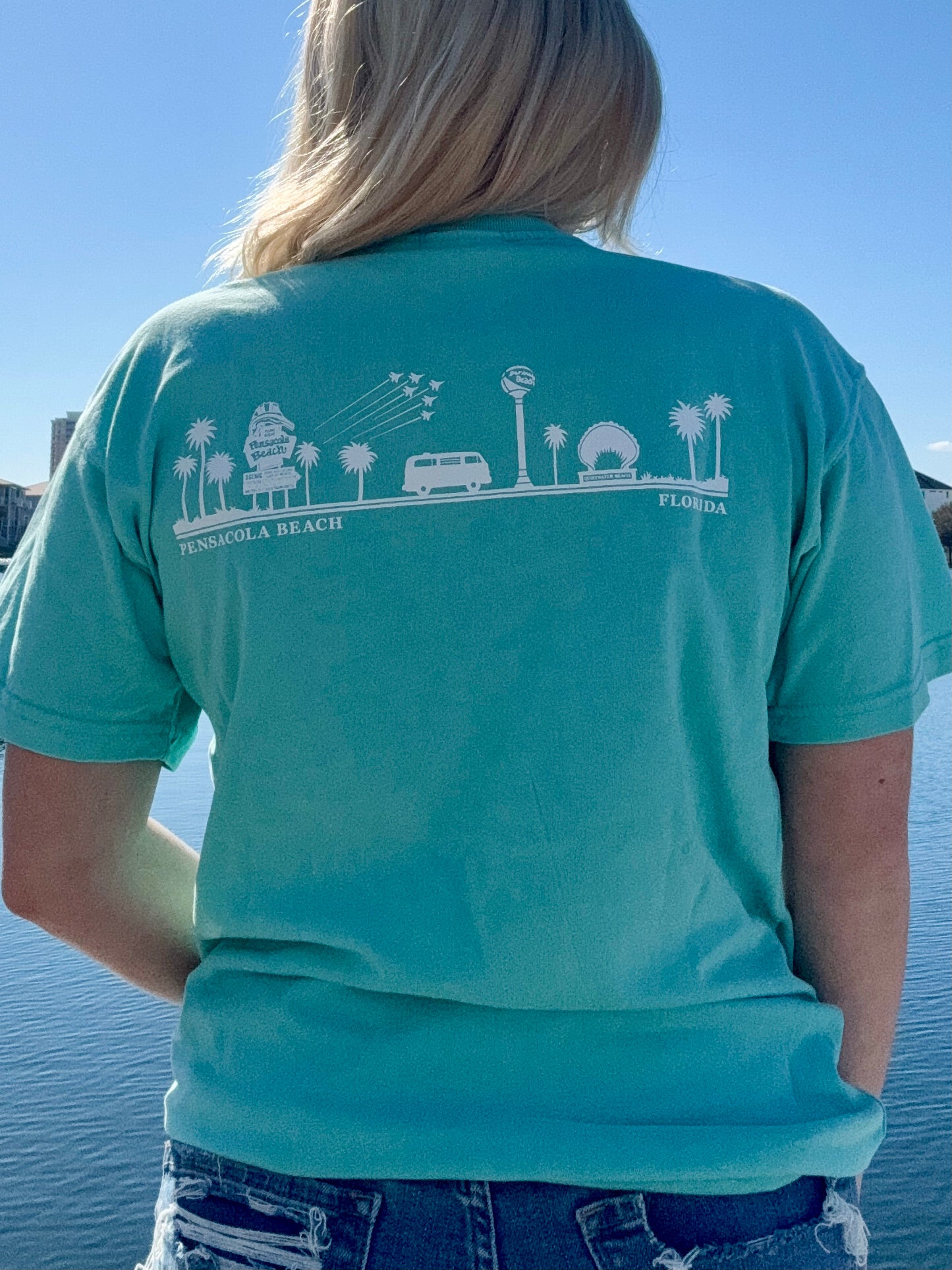 Pensacola Beach Icon T shirt in aqua back view shown on model size small