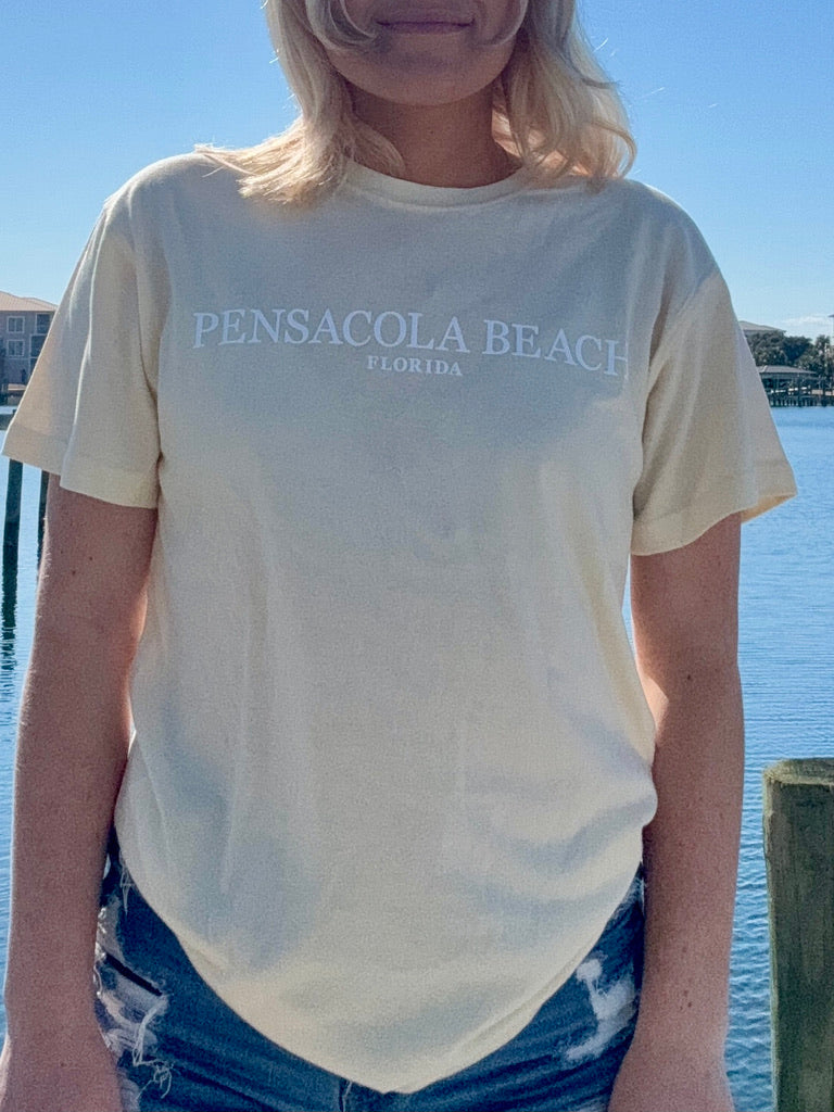 Pensacola Beach Icon T shirt in cream front view shown on model size small