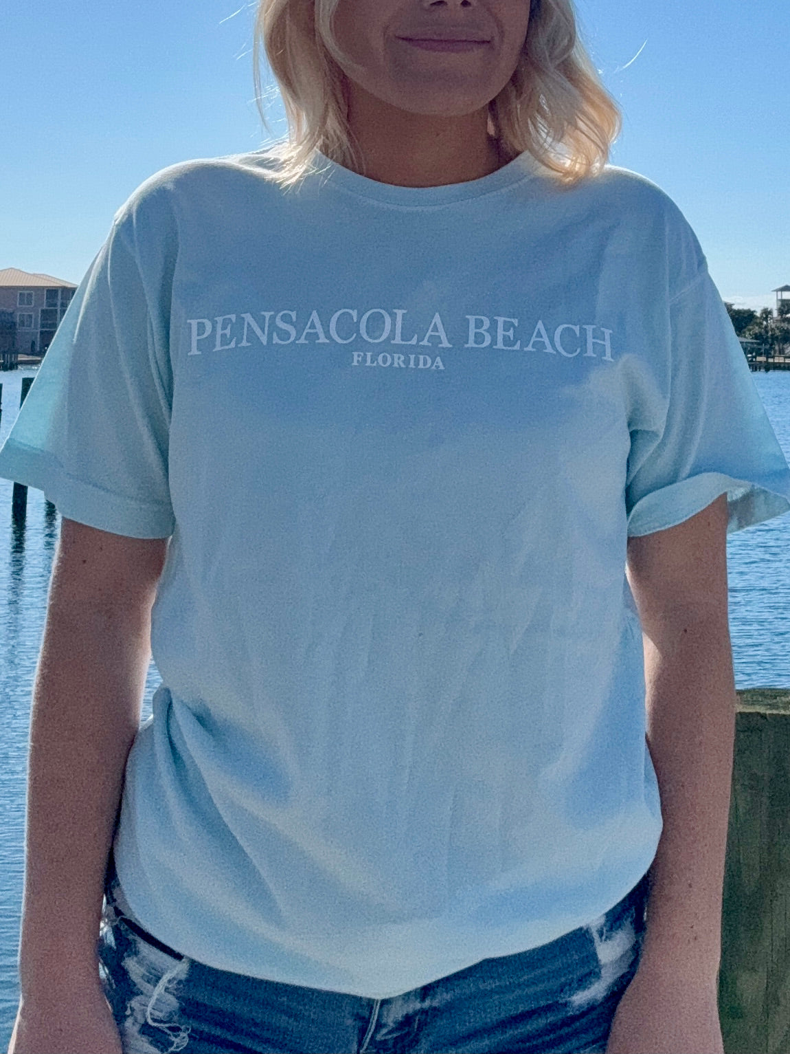 Pensacola Beach Icon T shirt in light blue front view shown on model size small