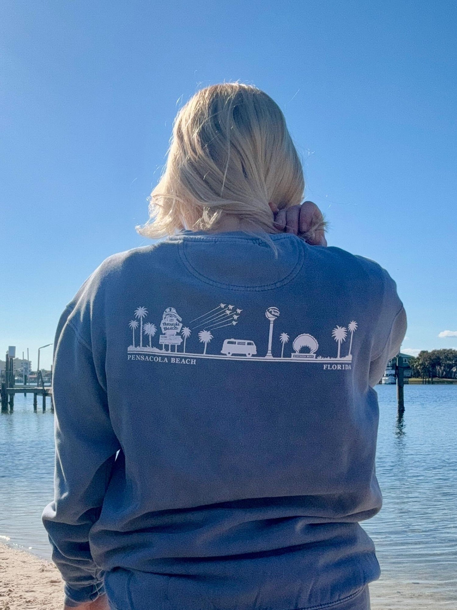Pensacola Beach Icon Sweatshirt in worn blue shown on model in a size small backview