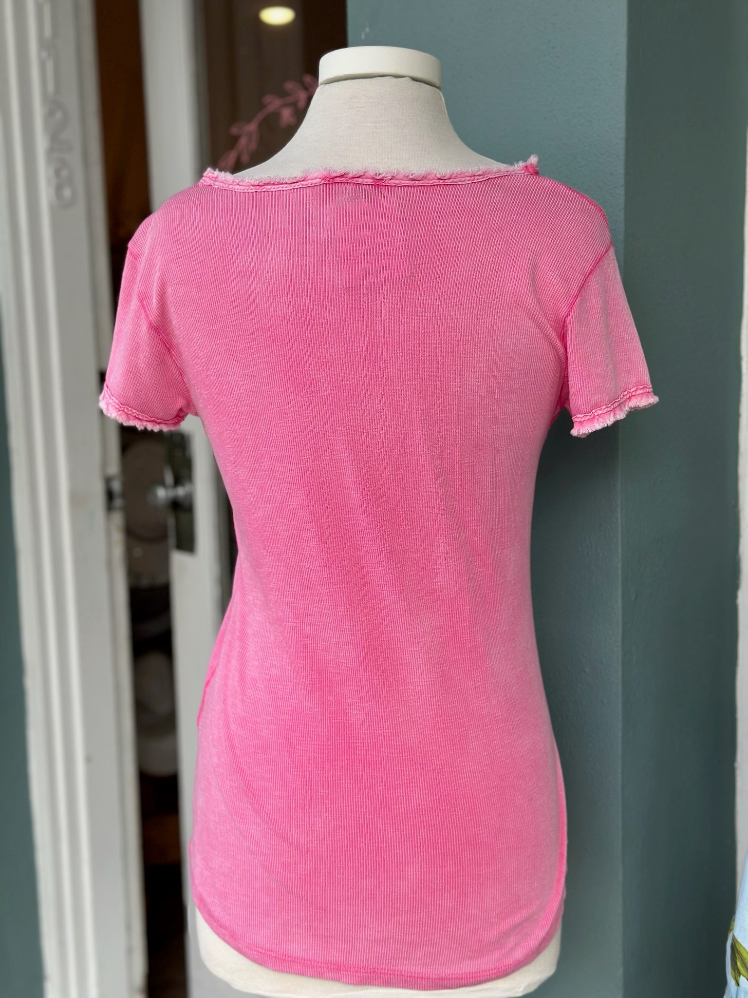 Reece Raw Edge Tee in Hot Pink back view on mannequin 