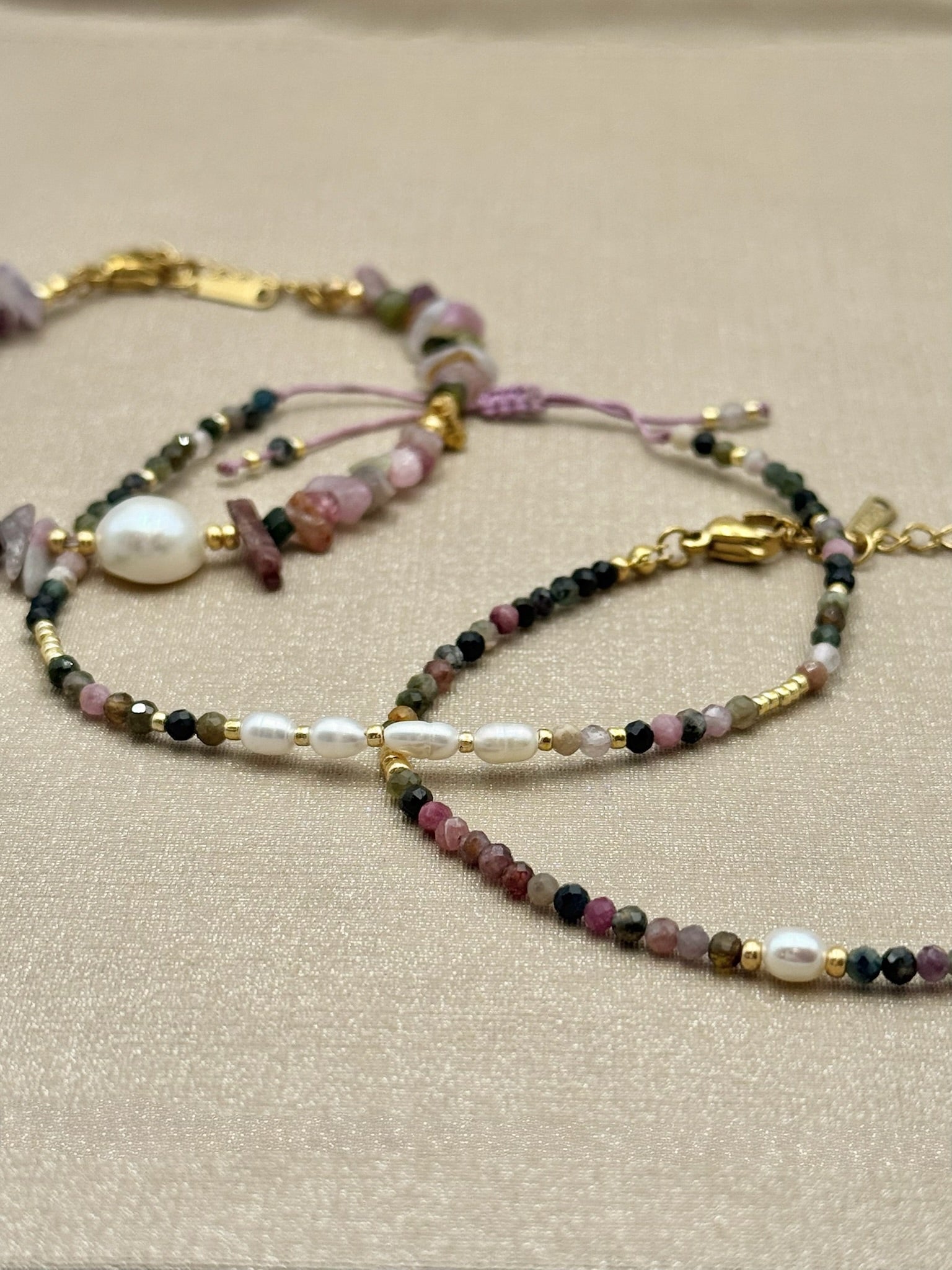 Romy Tourmaline & Freshwater Pearl Bracelet flat lay bracelet stack
