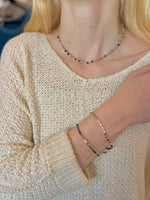 Romy Tourmaline & Freshwater Pearl Bracelet on model styled coordinating jewelry