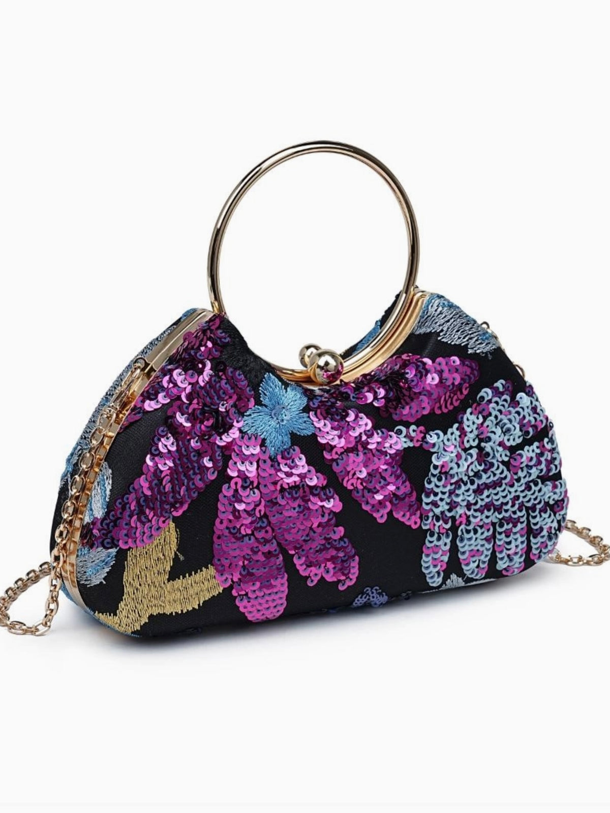 A small black sequined clutch handbag with a gold-tone circular top handle and chain strap. The bag features a vibrant floral pattern with purple, pink, blue, and gold sequins on a white background.