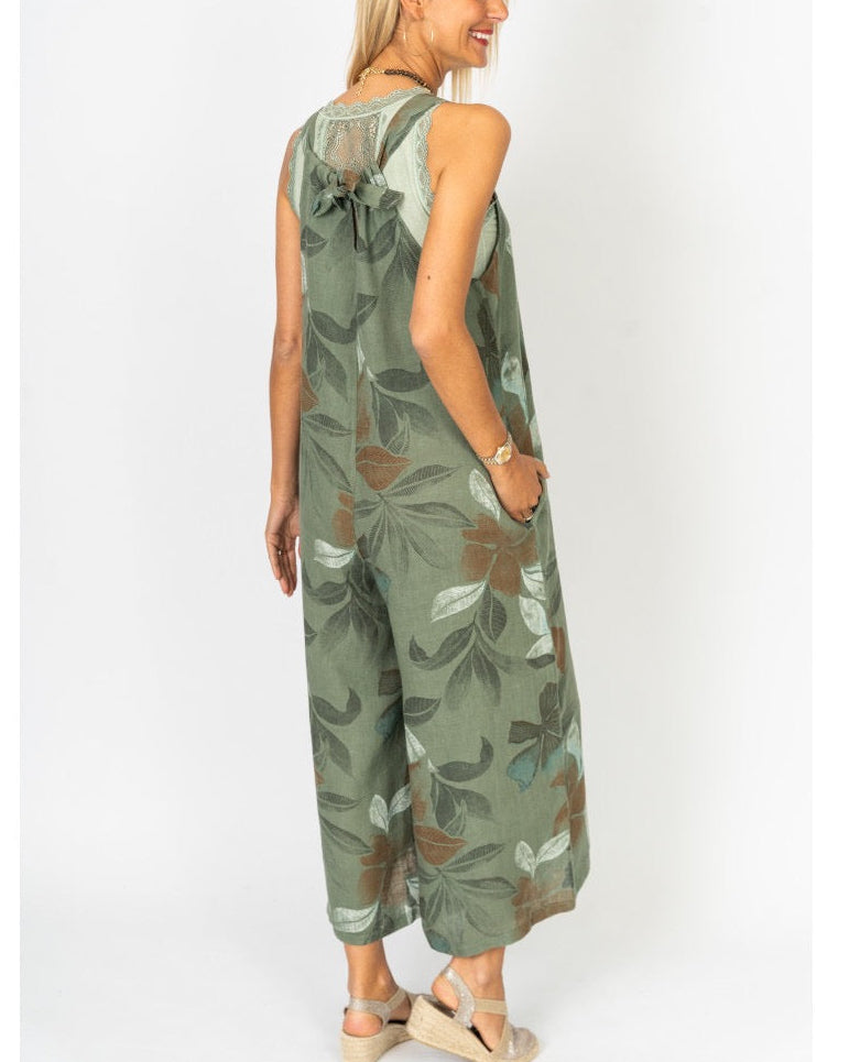 Back view of the Sienna Leaf Print Romper in Olive with adjustable tie detail