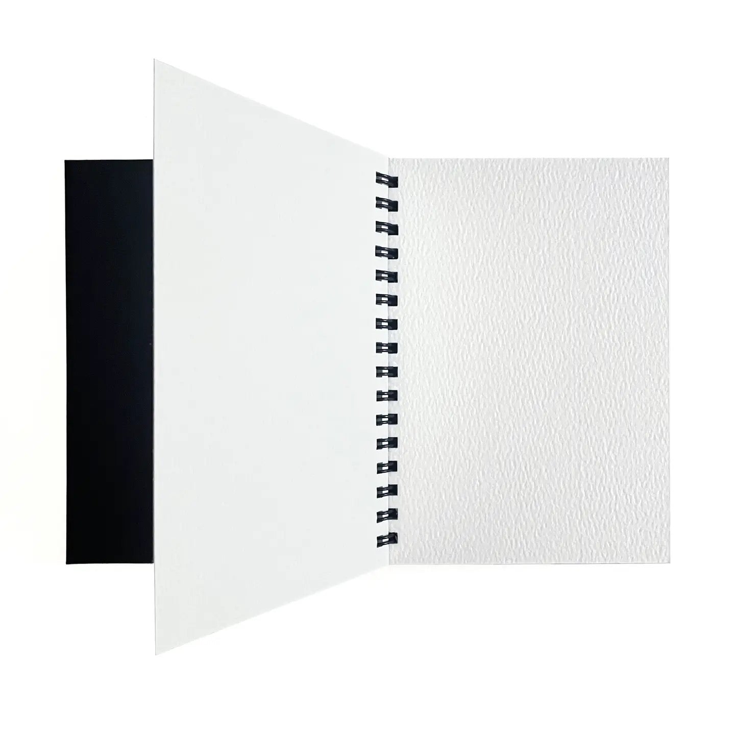 Open small spiral bound watercolor paper pad showing textured cold press pages suitable for watercolor gouache ink and mixed media