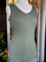 Stacey Necklace in silver styled with an olive green tank, featuring a delicate chain and subtle three-crystal accent at Ardor Boutique.