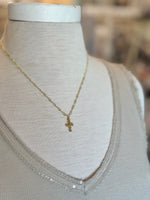 Talia Gold Cross Necklace on mannequin