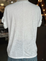 Back view of the white Terri V Neck Tee showing its relaxed silhouette, lightweight fabric, cuffed short sleeves, and center back seam at Ardor Boutique.
