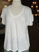 Front view of the Terri V Neck Tee in white featuring a relaxed fit, V neckline, cuffed short sleeves, and lightweight fabric at Ardor Boutique.