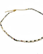 Necklace with small beads on a white background