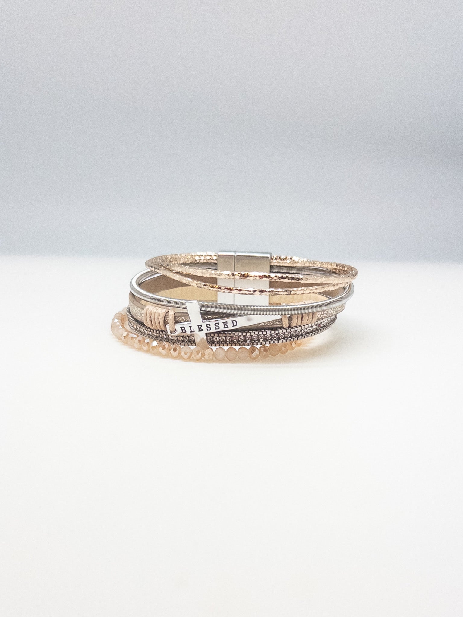 The Marie Blessed Bracelet shown on a white backdrop showing details and magnetic clasp 
