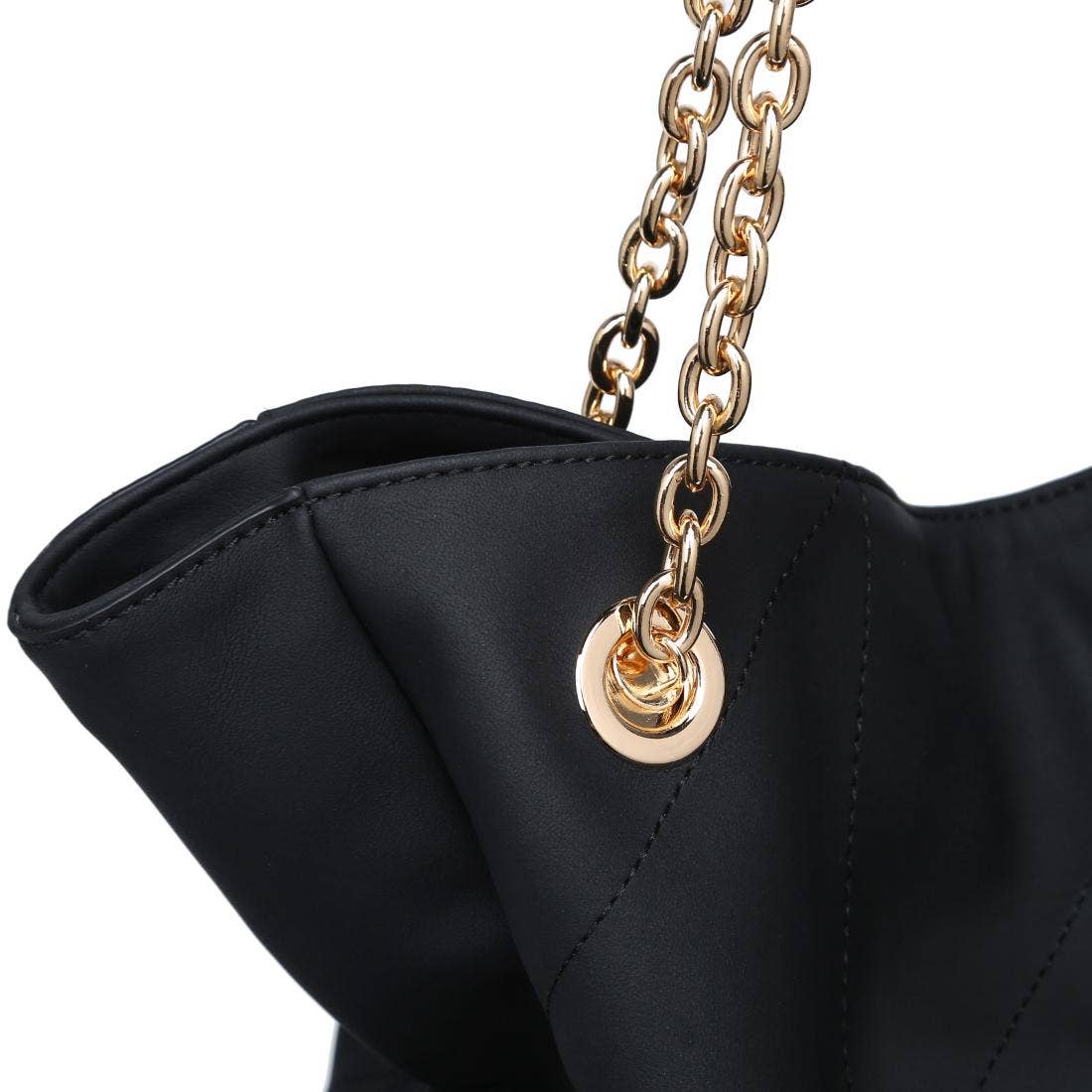 Black handbag with a gold chain and clasp on a white background