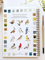 Birds Watercolor Workbook back cover showing 12 painted bird illustrations with color swatches, spiral bound by Emily Lex