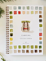 Camping Watercolor Workbook front cover with watercolor backpack and color palette border, spiral bound by Emily Lex