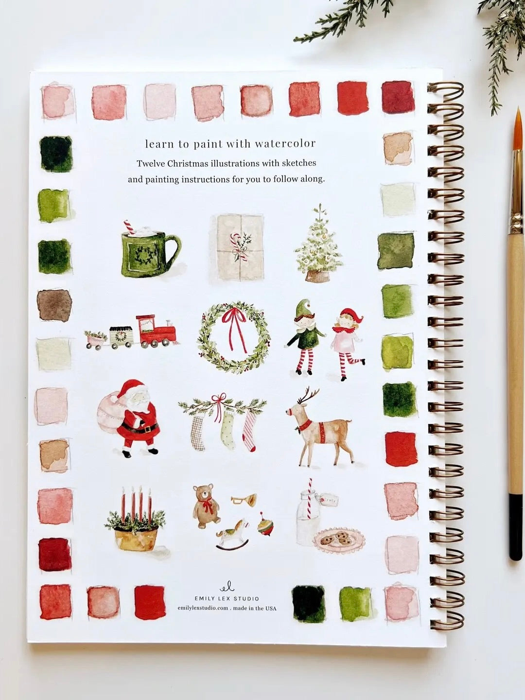 Christmas Watercolor Workbook back cover with twelve watercolor illustrations and color swatches, spiral bound by Emily Lex