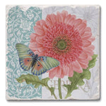 Decorative tile coaster with pink flower and butterfly design on a white background