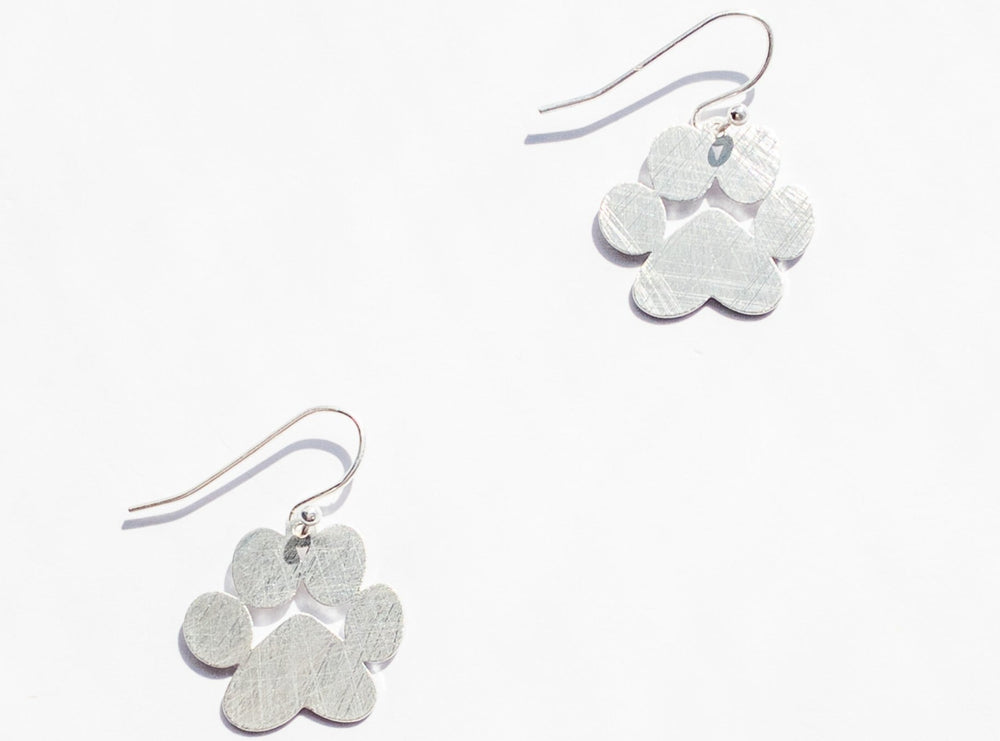 Silver dangle earrings with Paw print design Lightweight feel Length : 1"