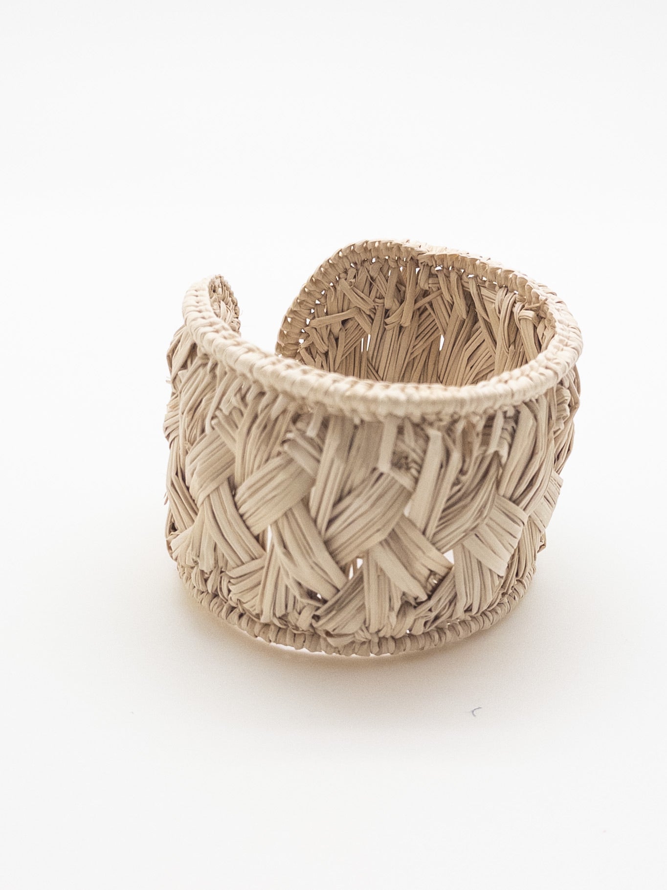 Atiya braided cuff in natural iraca palm color 