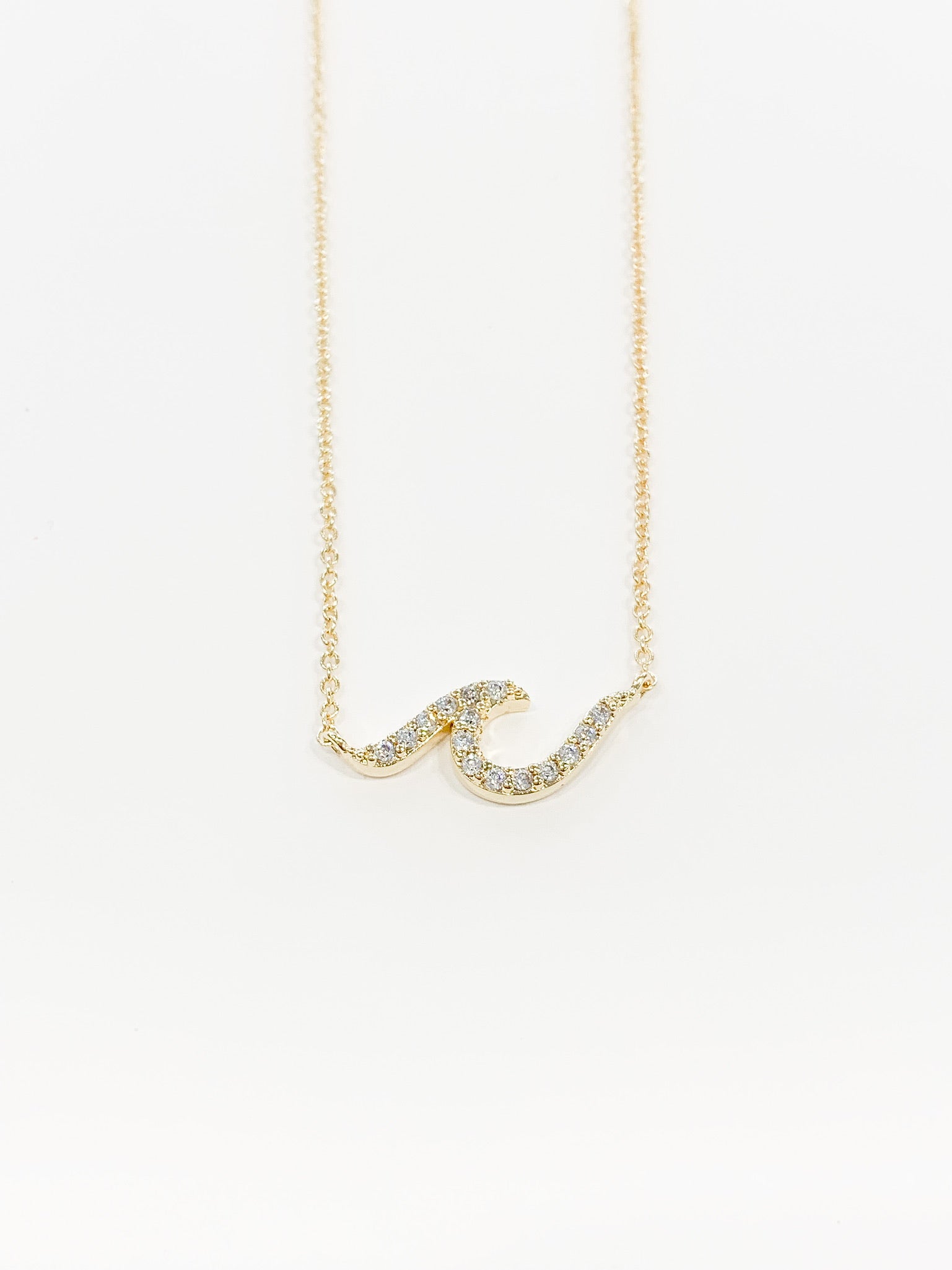 Avainna large wave necklace in gold. with crystals 