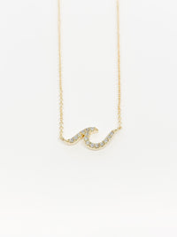 Avainna large wave necklace in gold. with crystals 
