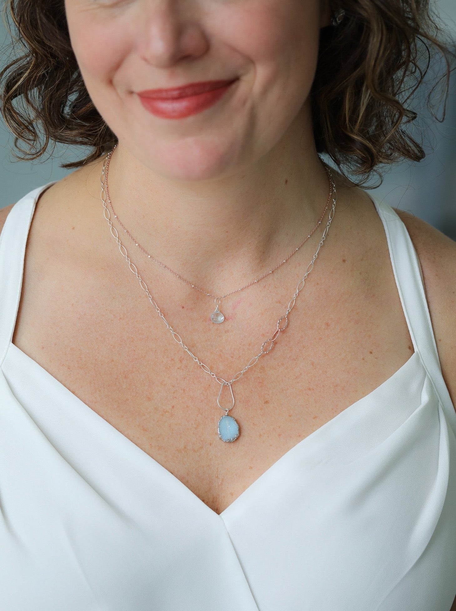 Serenity necklace shown layered 