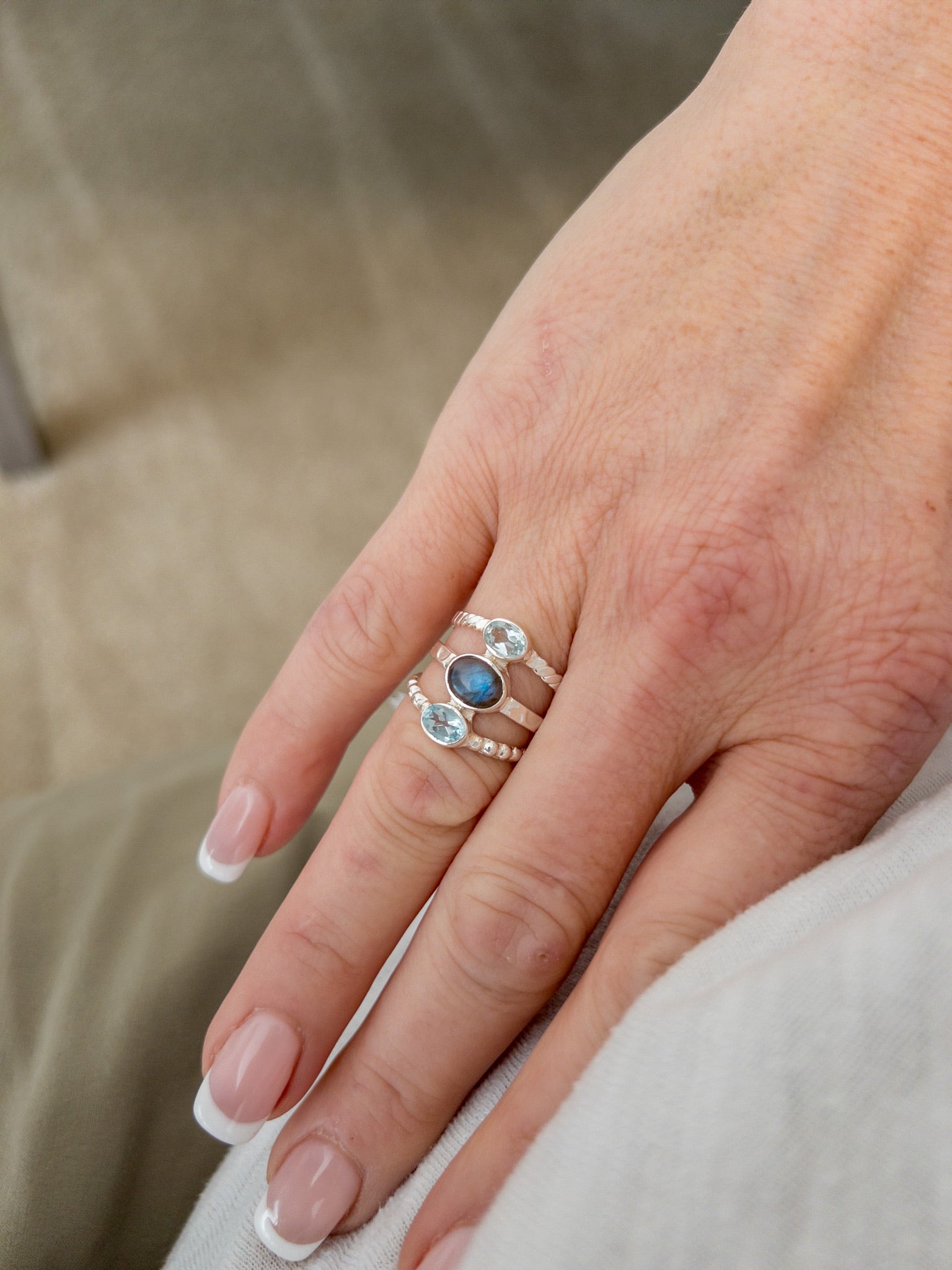 trinity ring on model- labradorite and blue topaz 