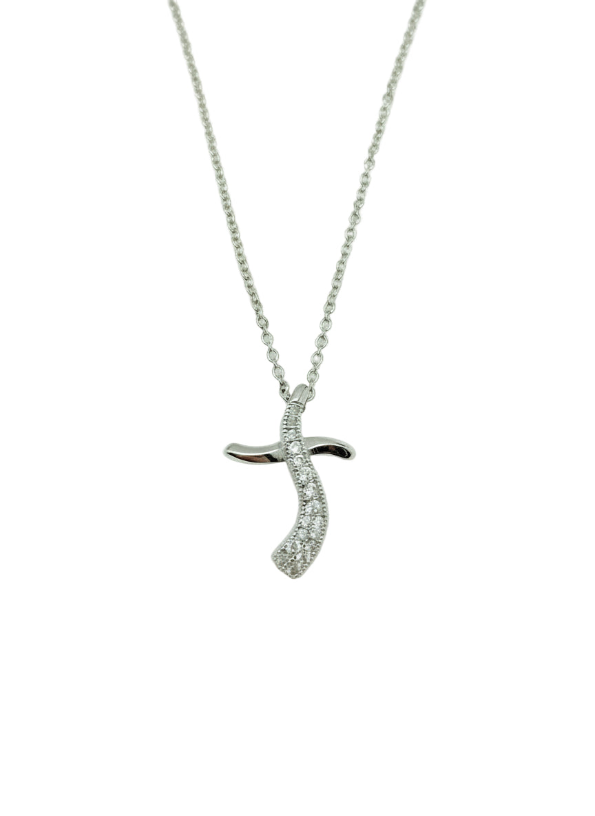 close up of sterling silver cross necklace from Ardor Boutique